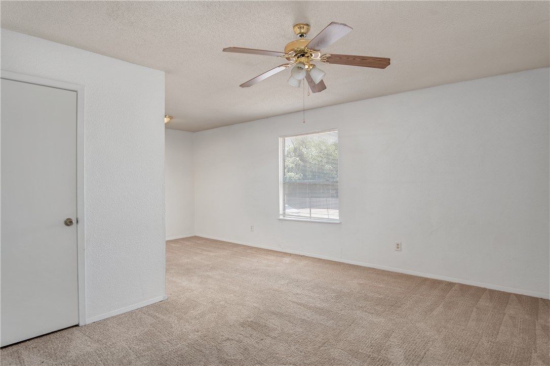 1501 Alpine Circle, Unit B College Station, TX 77840 - Photo 5 of 7 a view of an empty room with a window
