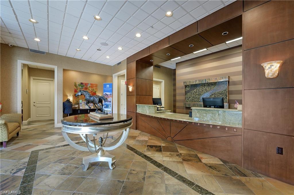 7940 Mahogany Run Lane, Unit 623 Naples, FL 34113 - Photo 16 of 25 a room with dining table and chairs