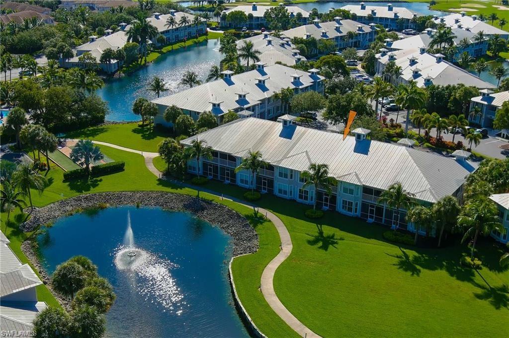 7940 Mahogany Run Lane, Unit 623 Naples, FL 34113 - Photo 19 of 25 an aerial view of a house with a swimming pool yard and outdoor seating