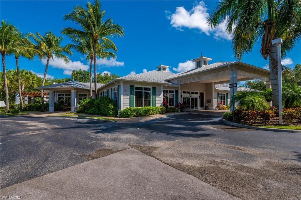 7940 Mahogany Run Lane, Unit 623 Naples, FL 34113 - Photo 21 of 25 front view of a house with a garden
