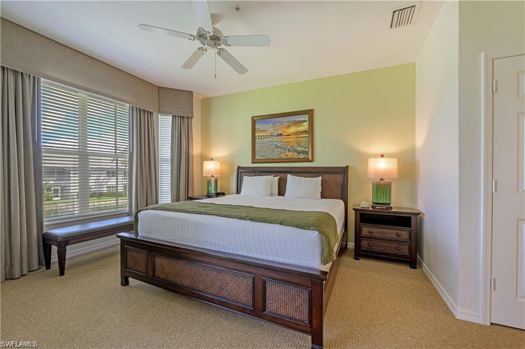 7940 Mahogany Run Lane, Unit 623 Naples, FL 34113 - Photo 10 of 25 a bedroom with a bed and a window