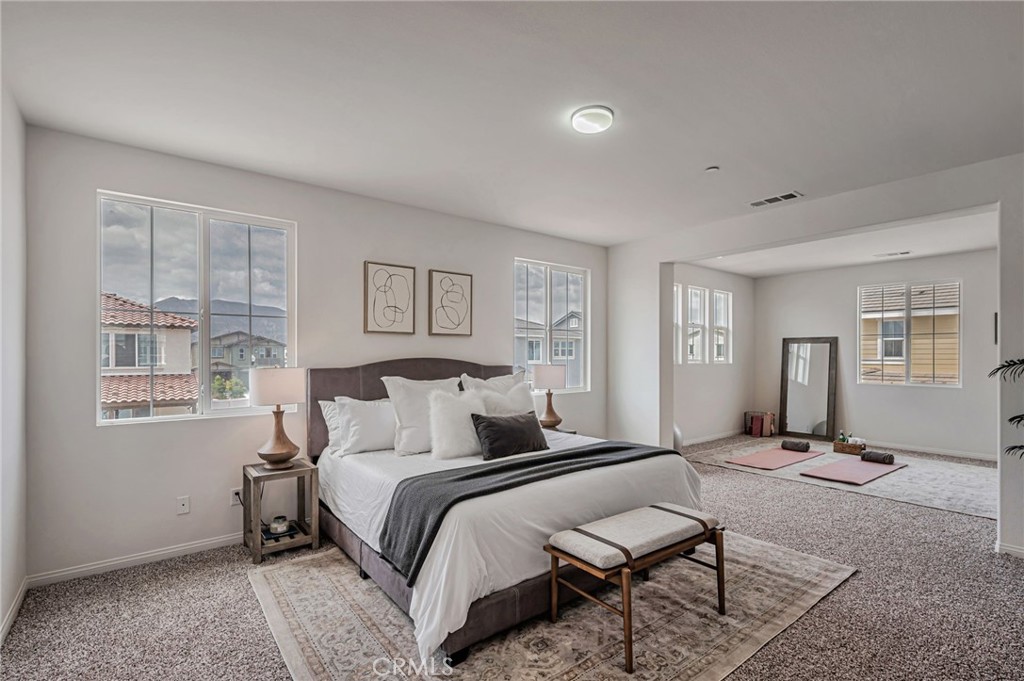 154 Azalea Street Fillmore, CA 93015 - Photo 7 of 37 a bedroom with a bed and window