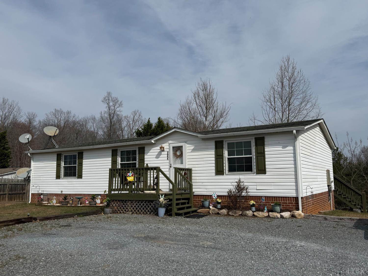 304 Plain Ridge Drive Evington, VA 24550 - Photo 2 of 16 a view of a house with a yard