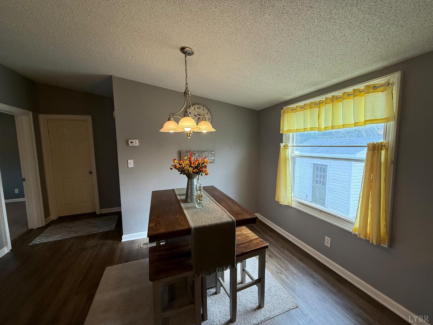 304 Plain Ridge Drive Evington, VA 24550 - Photo 6 of 16 a view of a dining room with furniture window and wooden floor