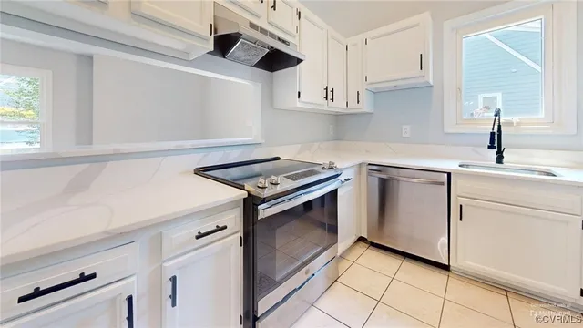 a view of dining table with chairs in workspace