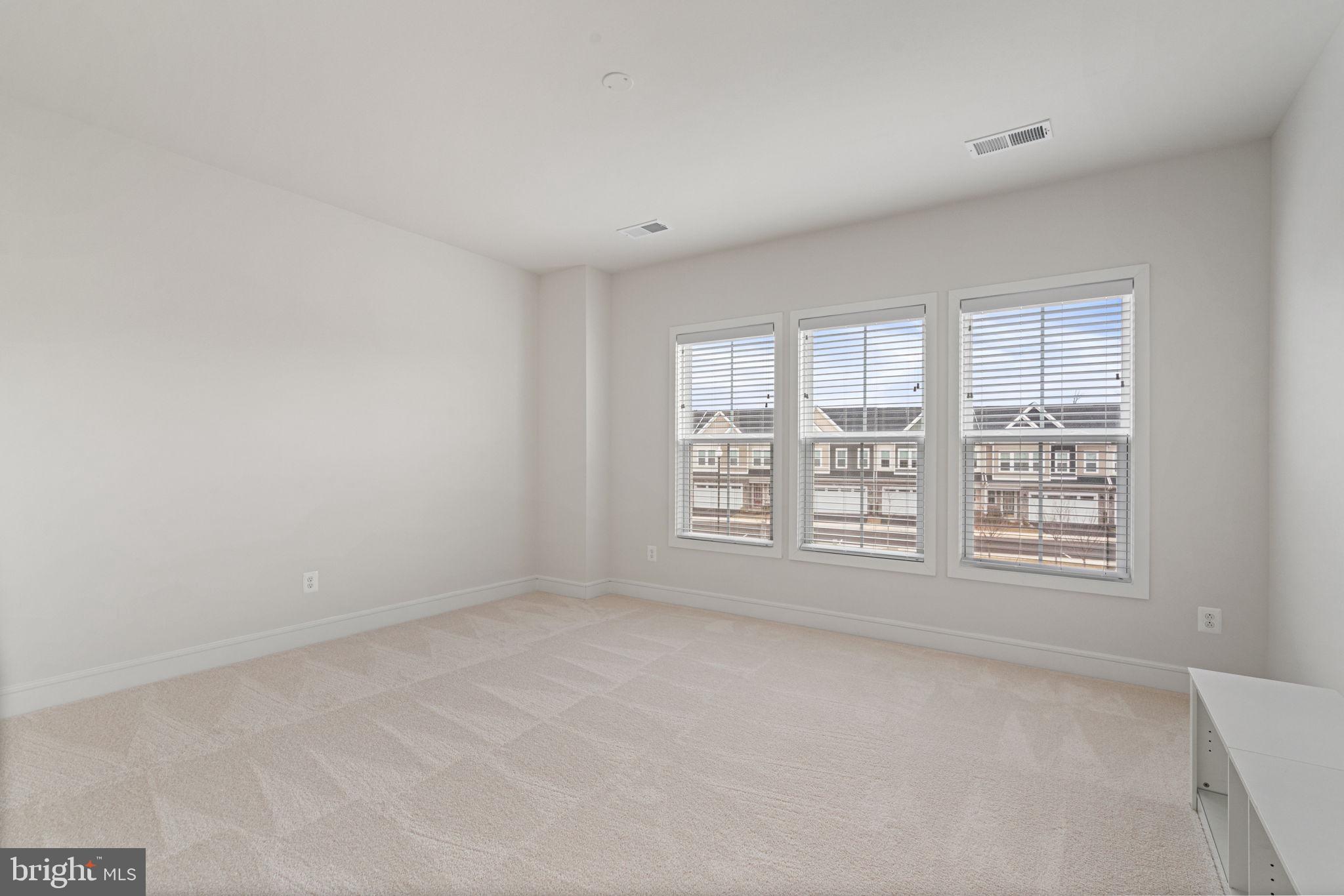 14712 Grand Cru Loop Gainesville, VA 20155 - Photo 28 of 46 an empty room with a window