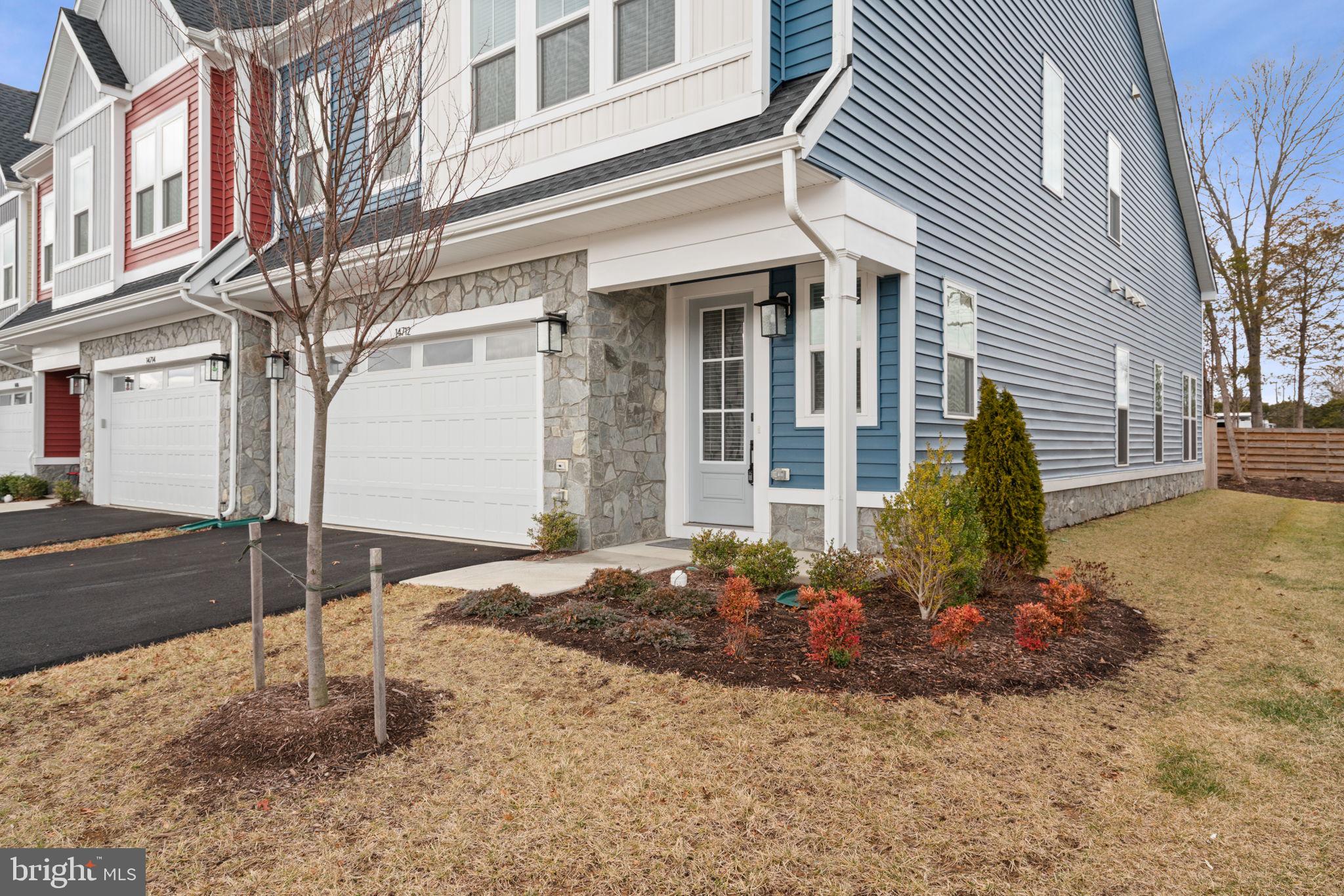 14712 Grand Cru Loop Gainesville, VA 20155 - Photo 36 of 46 a view of a house with a patio