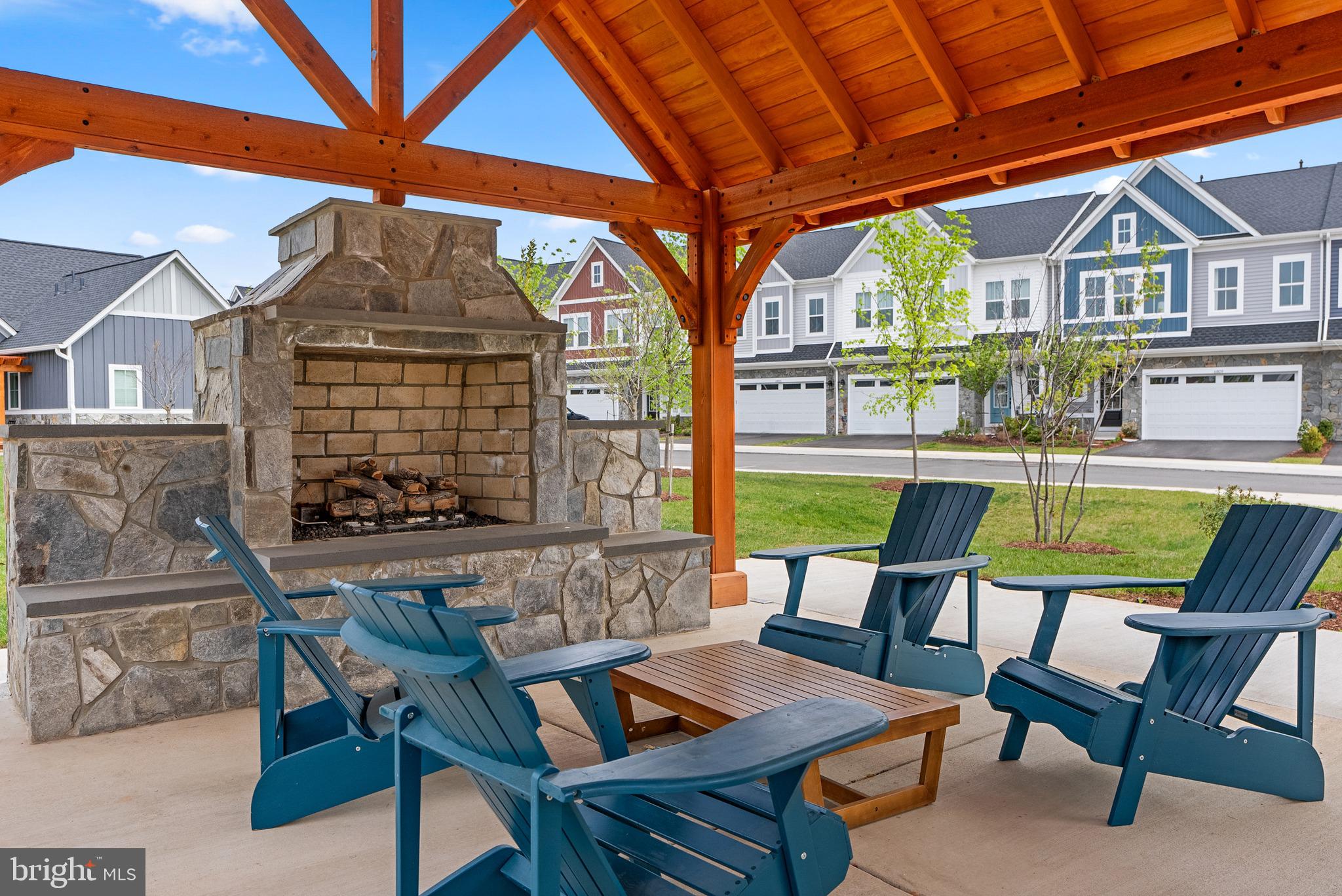 14712 Grand Cru Loop Gainesville, VA 20155 - Photo 40 of 46 a view of a chairs and table in the patio