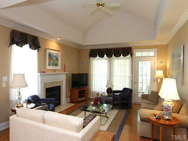 3404 Sir Colleton Court Raleigh, NC 27612 - Photo 4 of 25 Another view of the living room, note the trey ceiling. The door at the back goes to a wonderful screened porch. Living Room