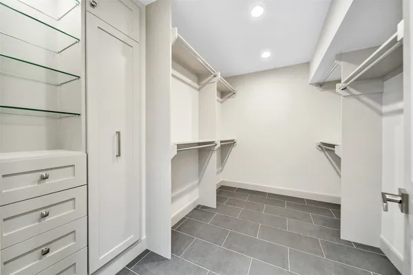 a view of an empty walk in closet