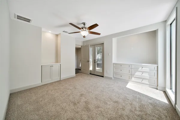 a view of an empty walk in closet