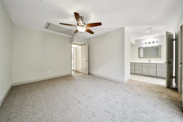 an empty room with a bathroom