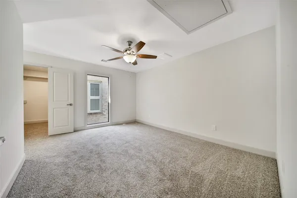 a view of a balcony with wooden floor