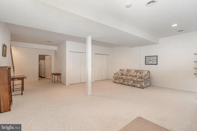 a view of livingroom with furniture and windows