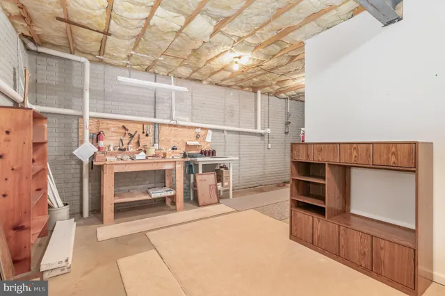 a view of a wooden deck and a yard