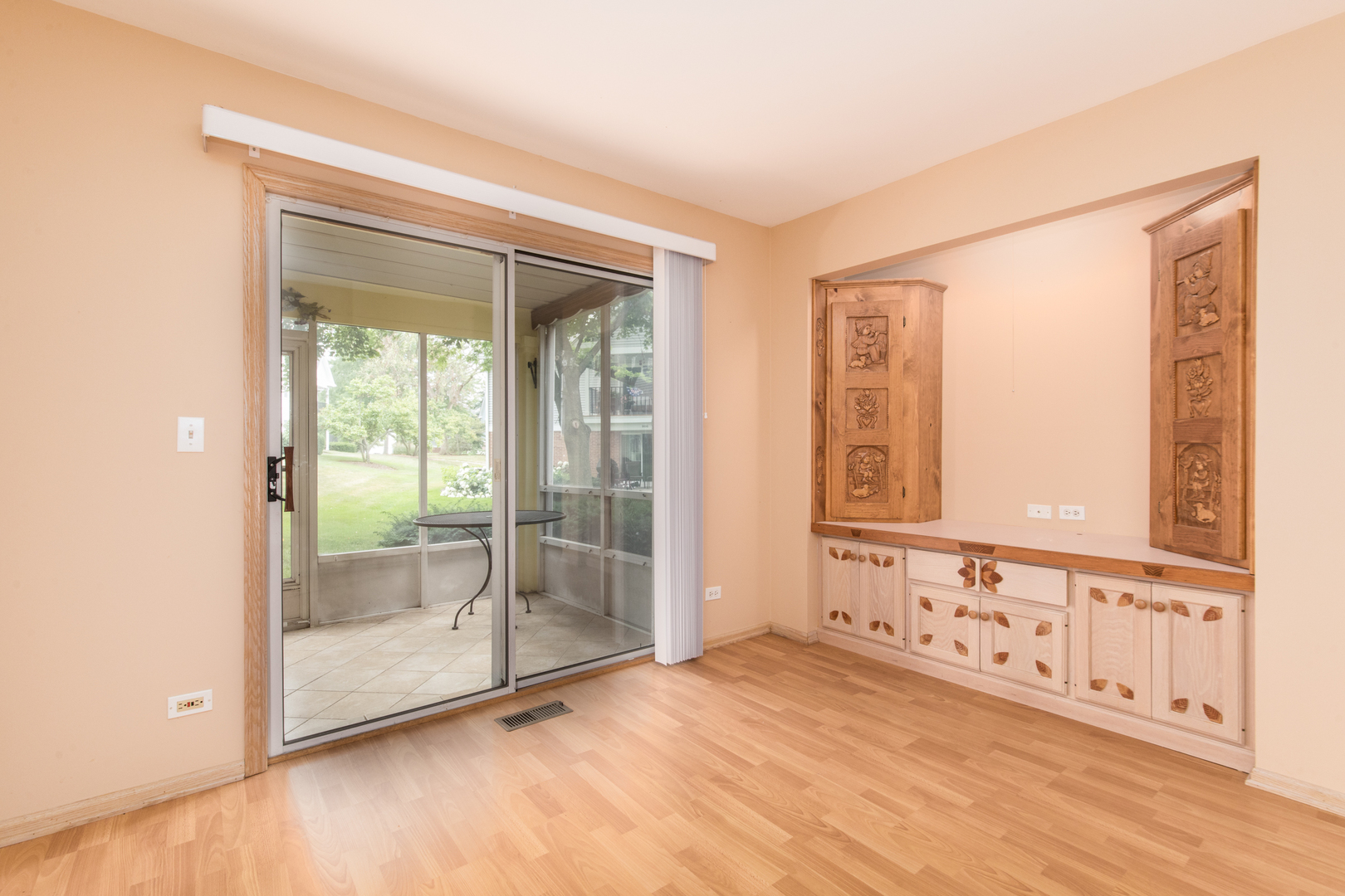 910 Persimmon Lane, Unit B Mount Prospect, IL 60056 - Photo 18 of 31 a view of an empty room with glass door