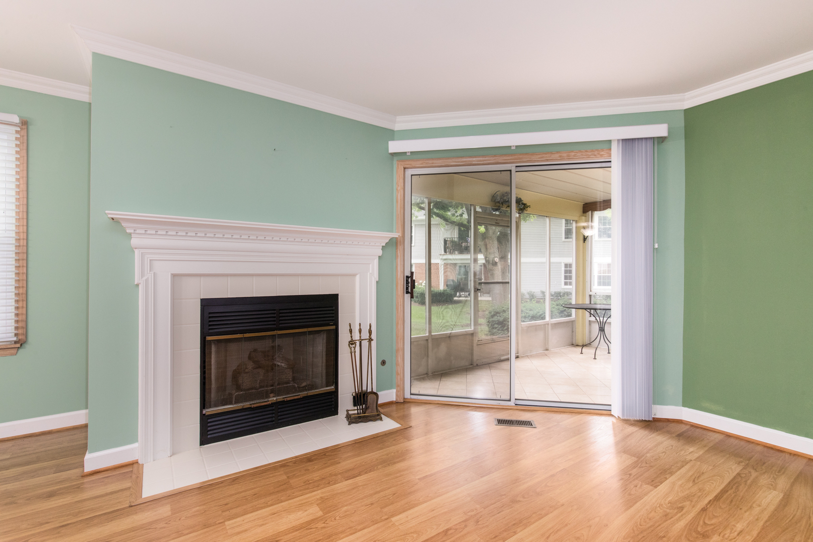 910 Persimmon Lane, Unit B Mount Prospect, IL 60056 - Photo 21 of 31 a view of an empty room with window and a fireplace