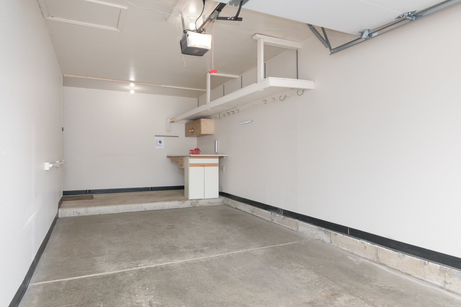 910 Persimmon Lane, Unit B Mount Prospect, IL 60056 - Photo 25 of 31 an empty room with shelves