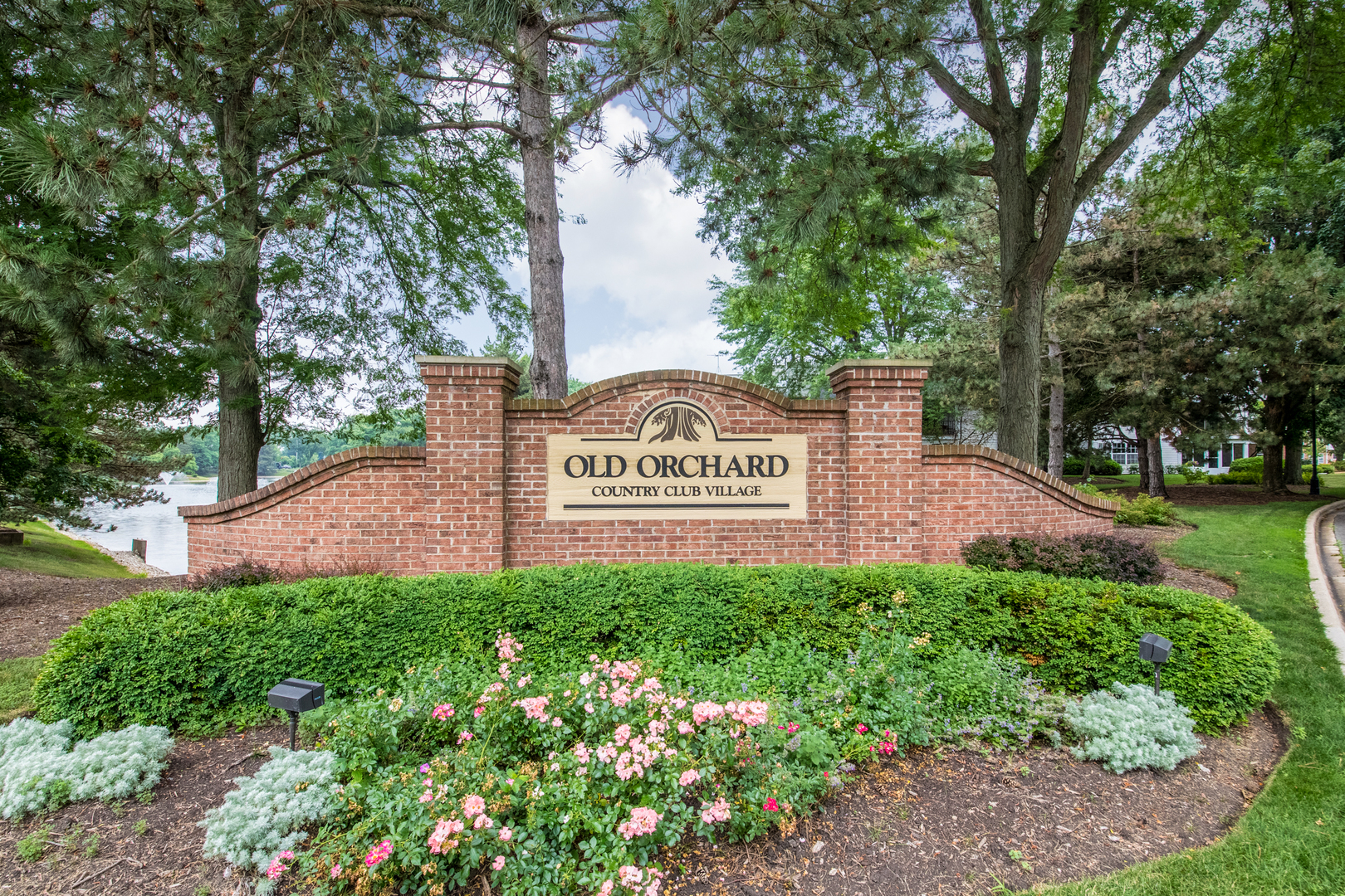 910 Persimmon Lane, Unit B Mount Prospect, IL 60056 - Photo 3 of 31 a sign on the side of the road