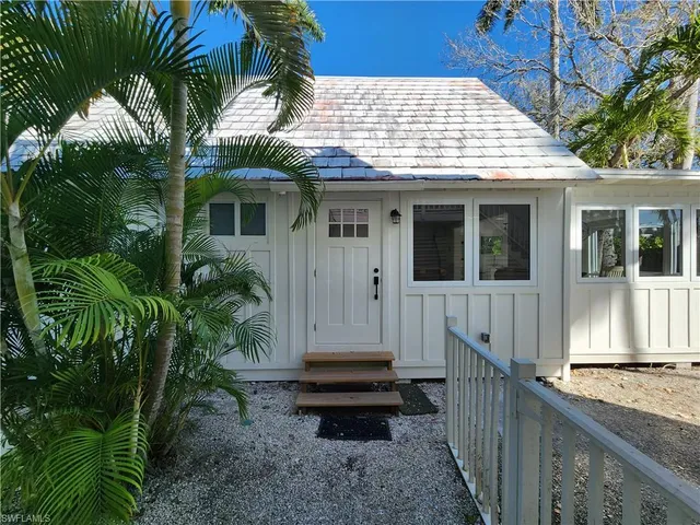 a front view of a house with a porch