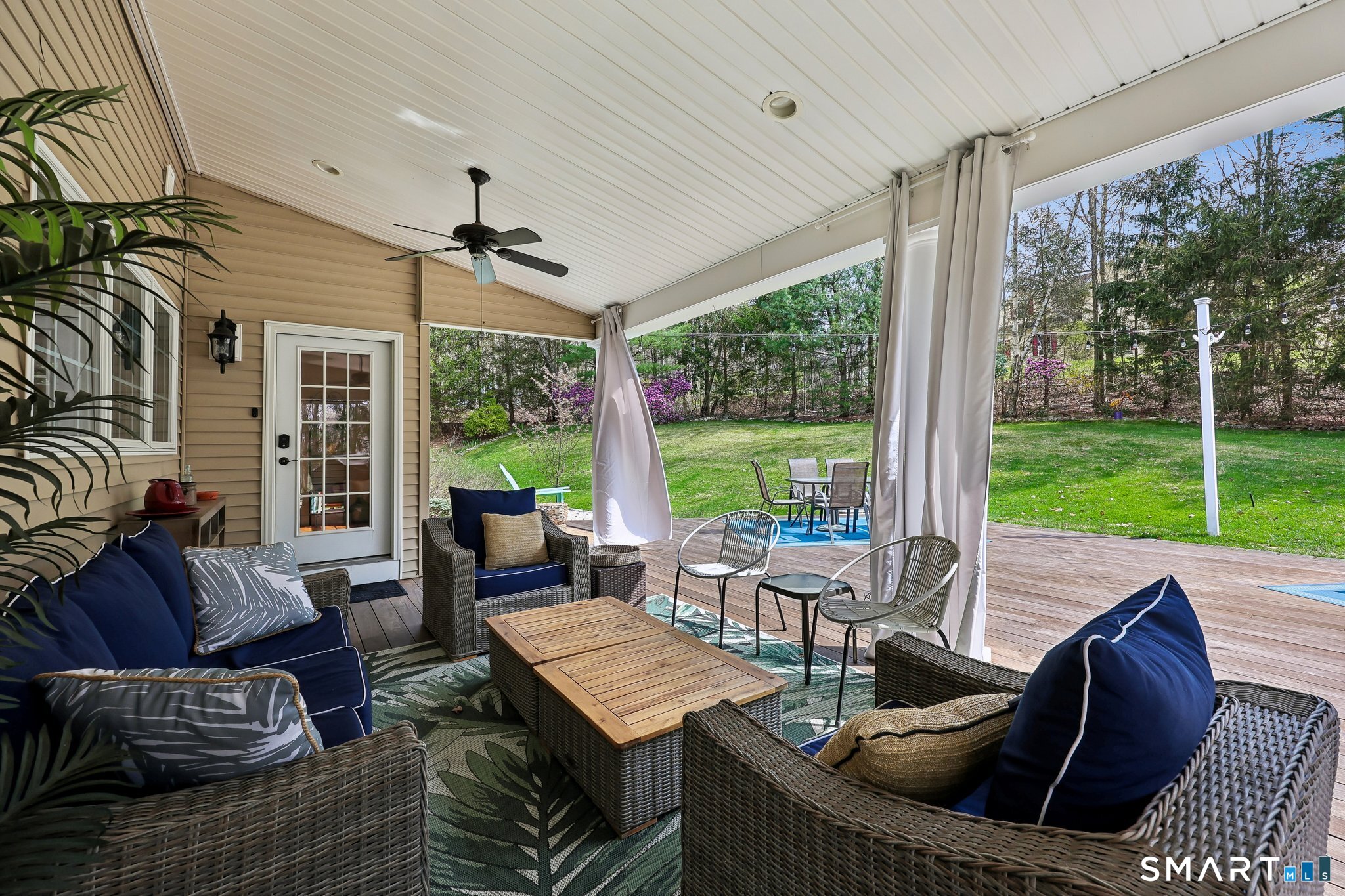 3 East Lake Road Danbury, CT 06811 - Photo 2 of 37 Covered back patio where you'll enjoy many summer nights.