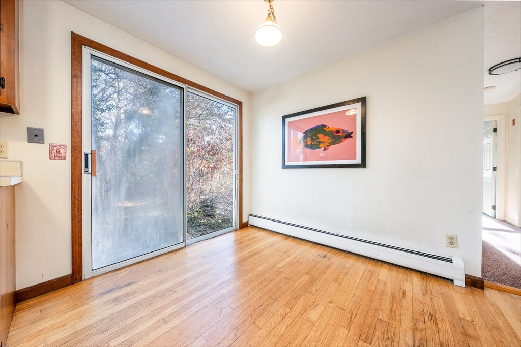 4 Lan Road Sandwich, MA 02563 - Photo 12 of 30 a view of an empty room with wooden floor and a window