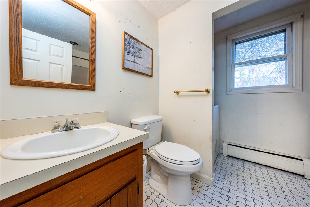 4 Lan Road Sandwich, MA 02563 - Photo 13 of 30 a bathroom with a sink and a toilet