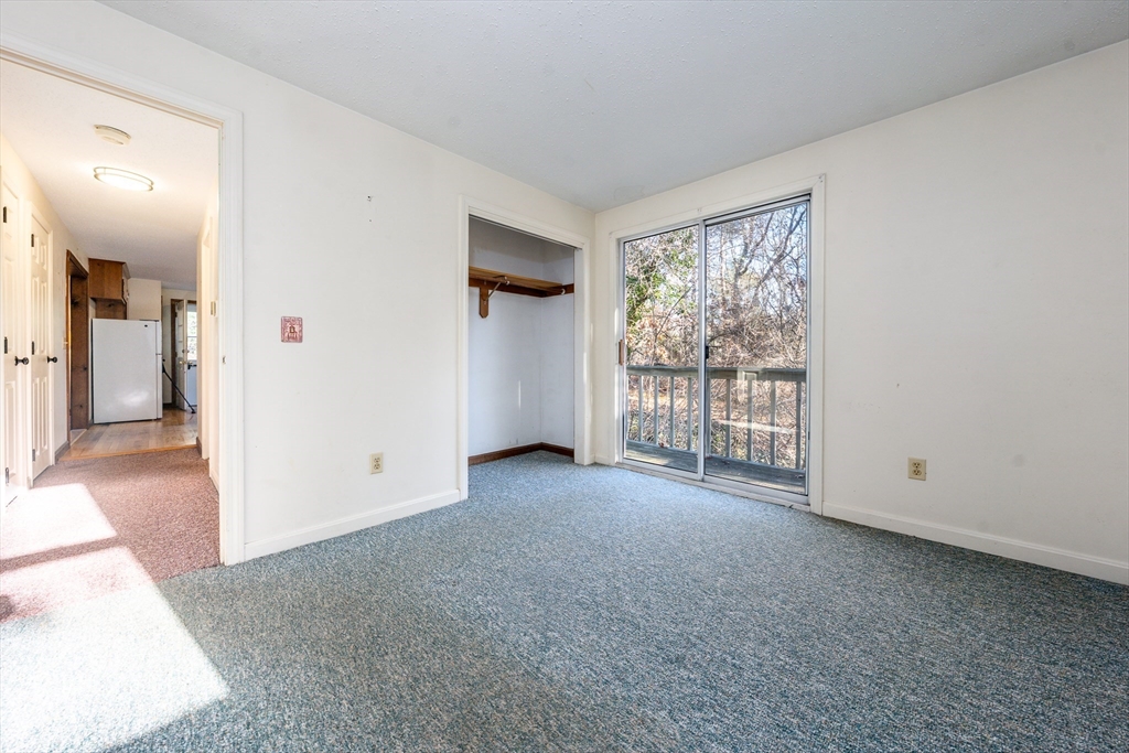 4 Lan Road Sandwich, MA 02563 - Photo 17 of 30 a view of a big room with windows and chandelier
