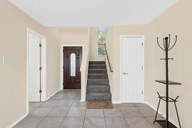 a view of a livingroom with a staircase