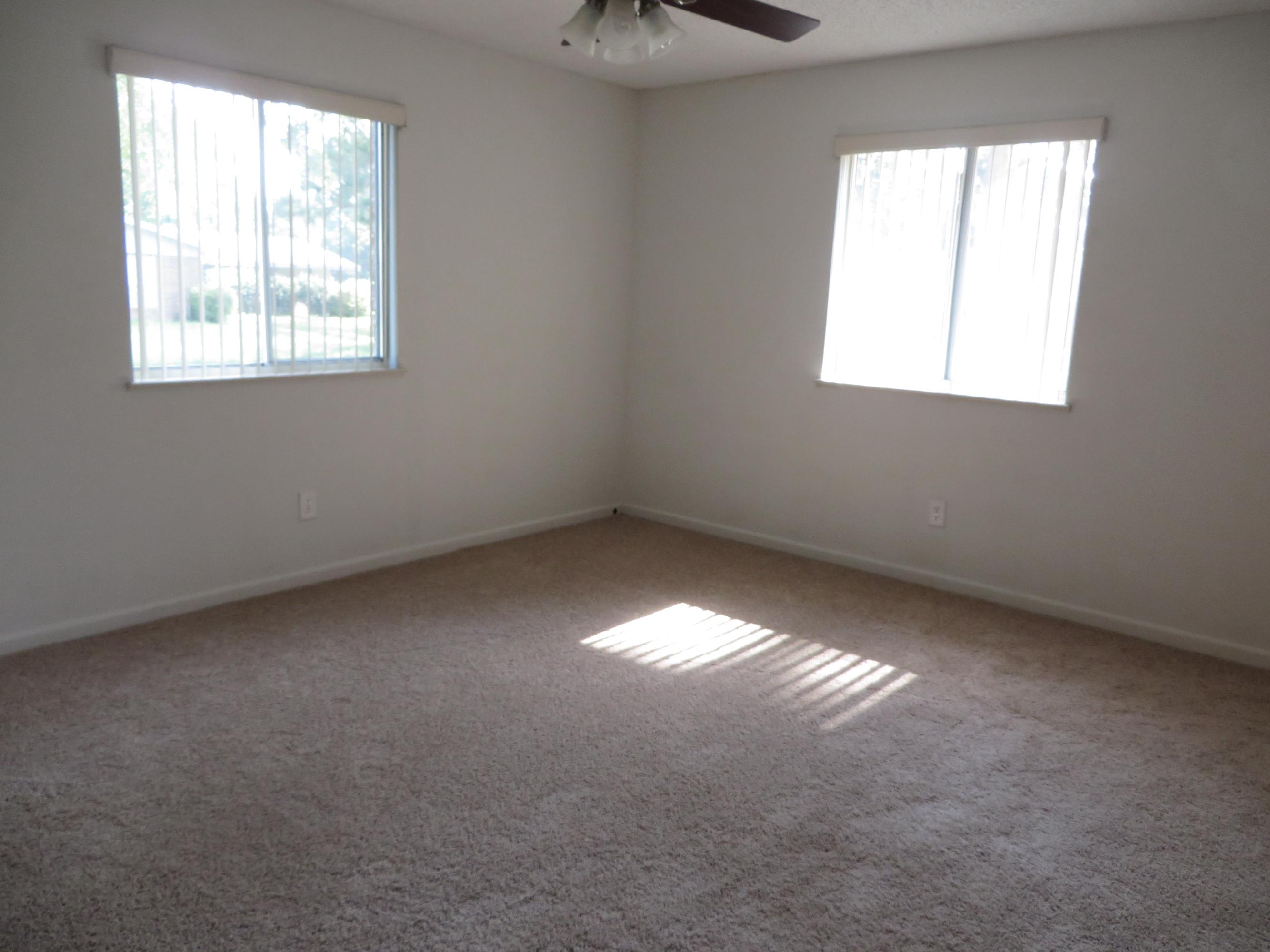 135 Perdido Circle Niceville, FL 32578 - Photo 18 of 28 an empty room with a window