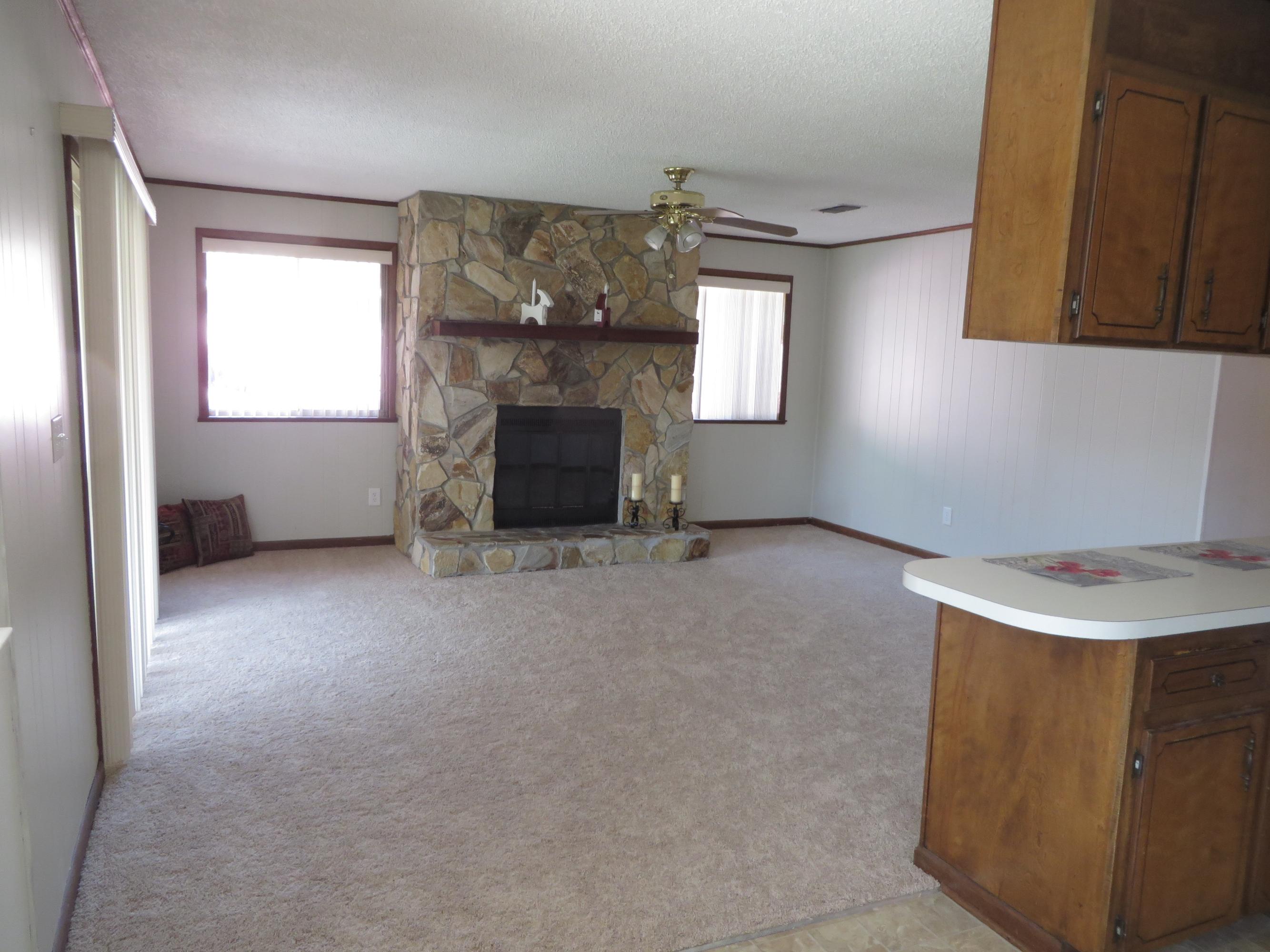 135 Perdido Circle Niceville, FL 32578 - Photo 27 of 28 a view of a livingroom with a fireplace