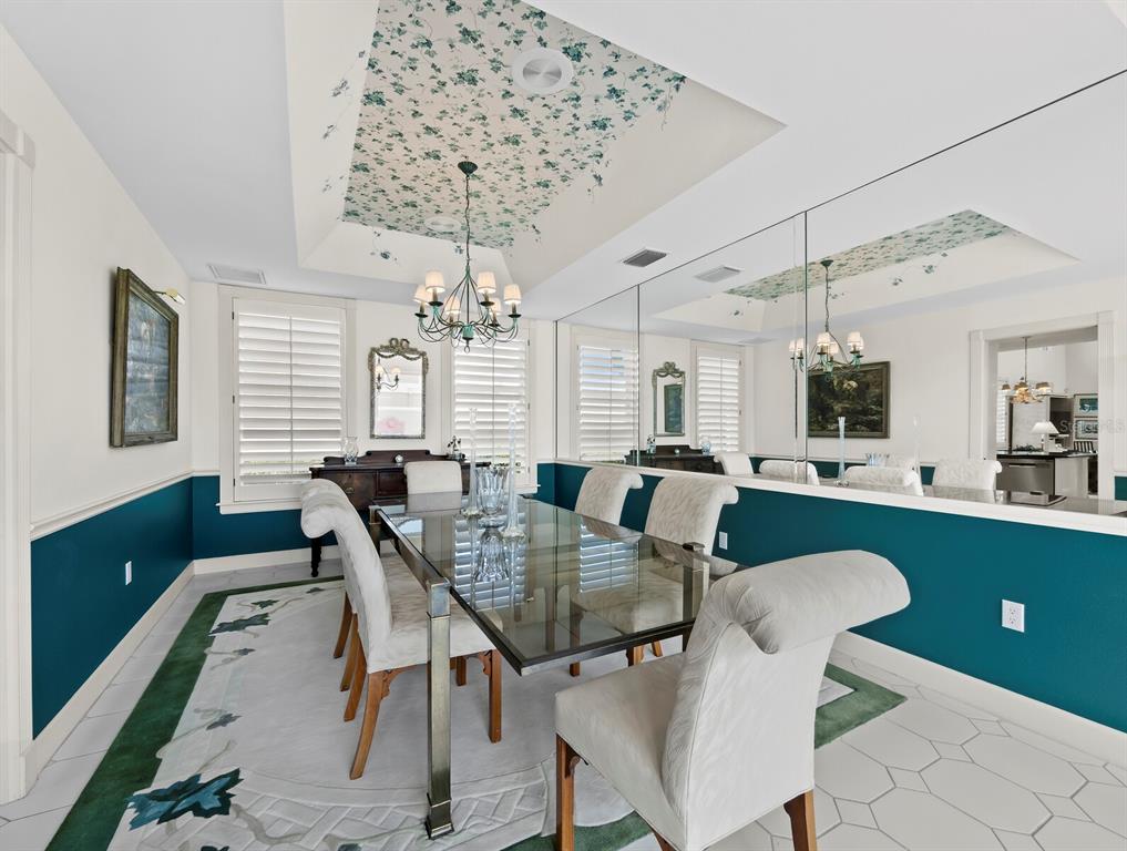 3543 Mistletoe Lane Longboat Key, FL 34228 - Photo 15 of 55 a view of a dining room with furniture and window