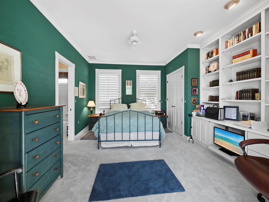 3543 Mistletoe Lane Longboat Key, FL 34228 - Photo 19 of 55 a bedroom with furniture and a window