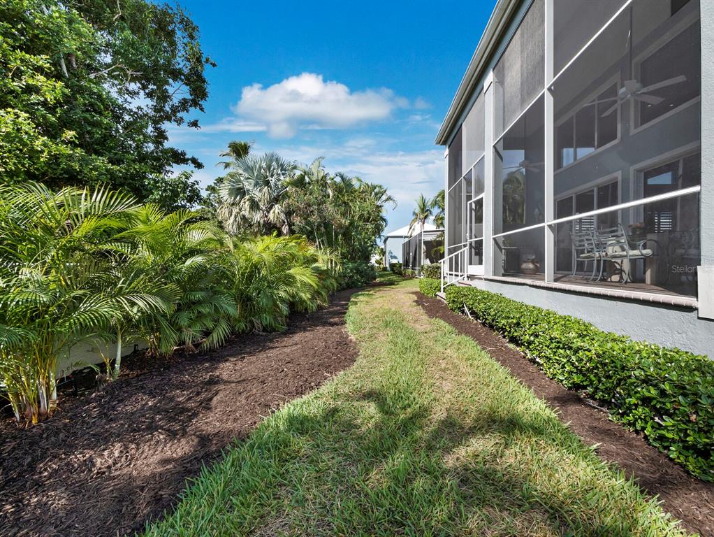 3543 Mistletoe Lane Longboat Key, FL 34228 - Photo 25 of 55 a view of a garden with pathway