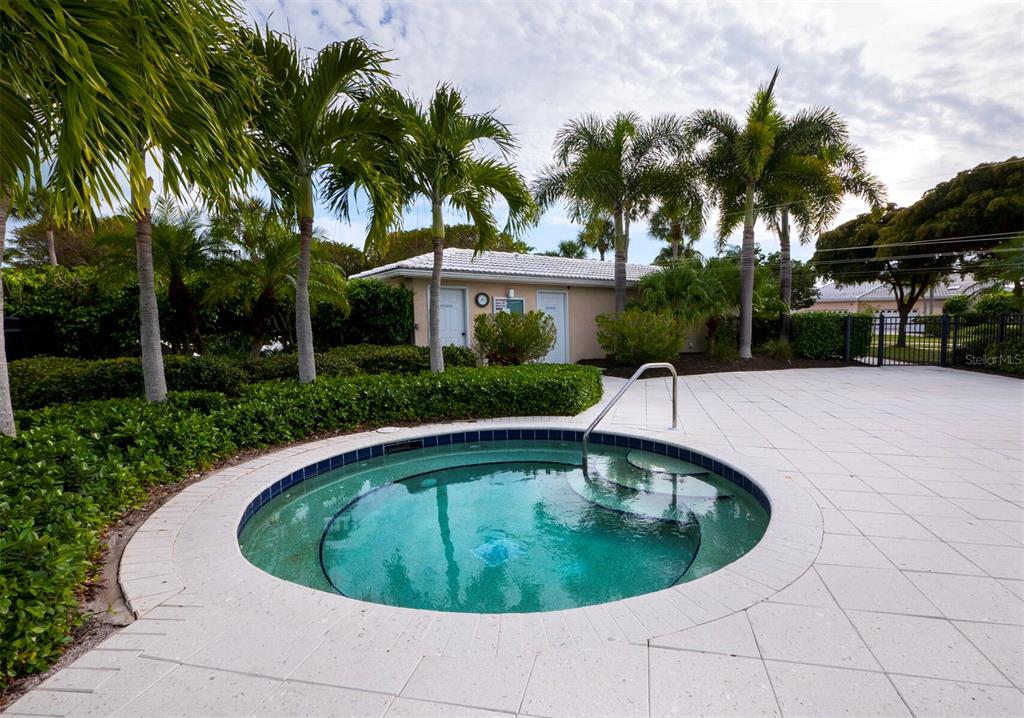 3543 Mistletoe Lane Longboat Key, FL 34228 - Photo 28 of 55 a small pool with palm trees