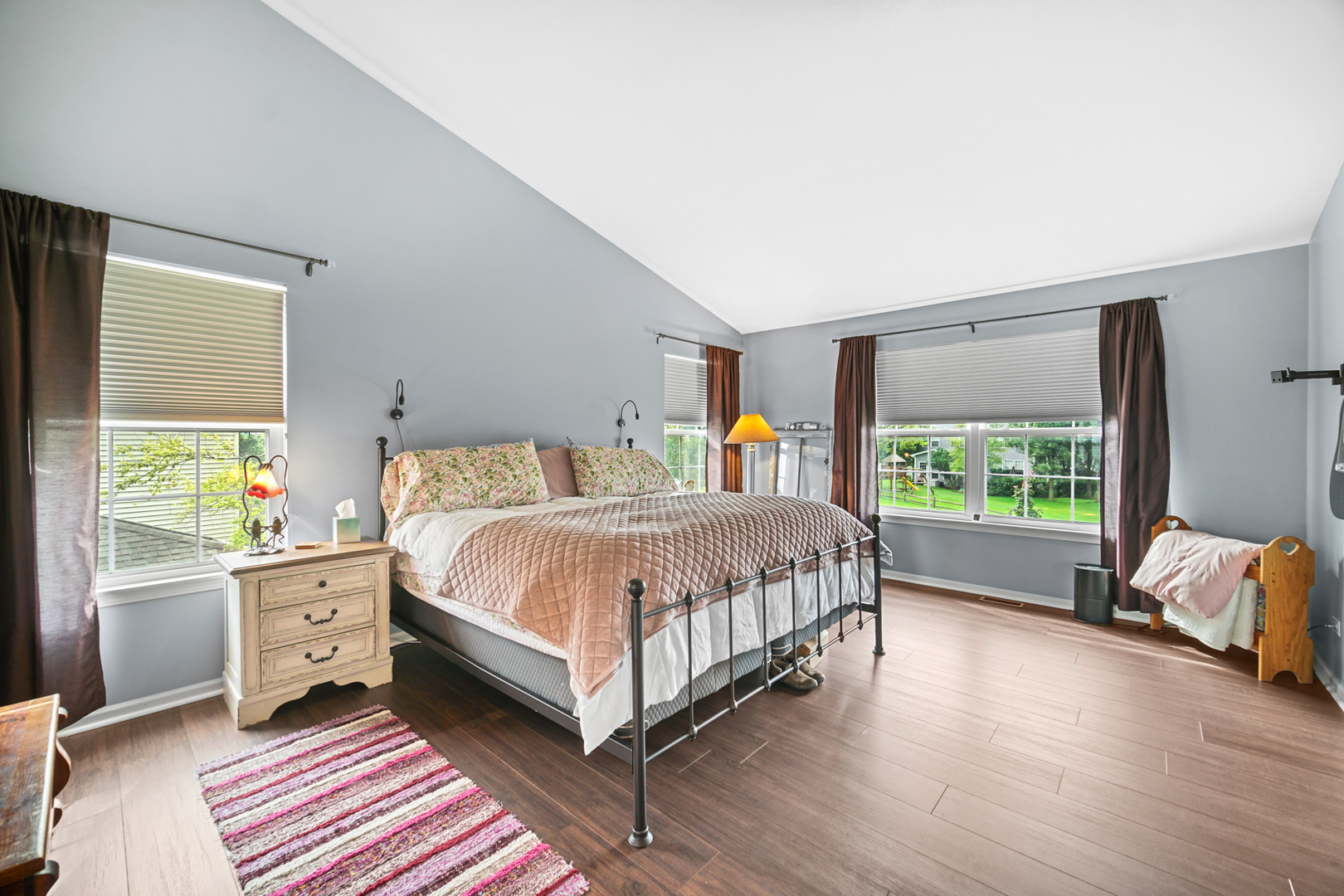 1826 Prairie Ridge Circle Lindenhurst, IL 60046 - Photo 15 of 39 a spacious bedroom with a bed and a large window