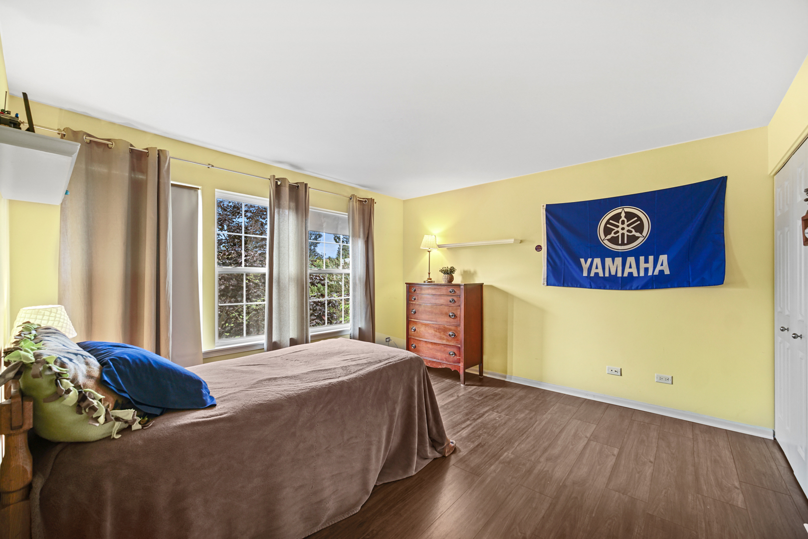 1826 Prairie Ridge Circle Lindenhurst, IL 60046 - Photo 18 of 39 a bed room with a bed and a large window