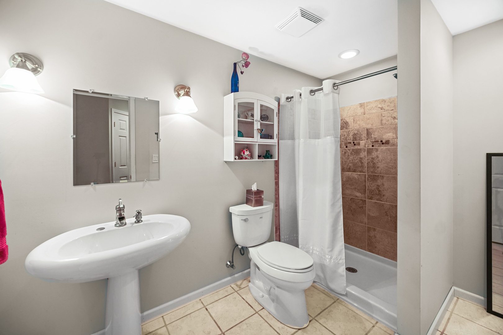 1826 Prairie Ridge Circle Lindenhurst, IL 60046 - Photo 28 of 39 a bathroom with a sink toilet and shower