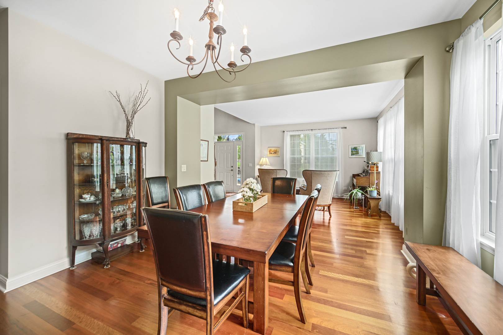 1826 Prairie Ridge Circle Lindenhurst, IL 60046 - Photo 6 of 39 a view of a dining room with furniture wooden floor and chandelier