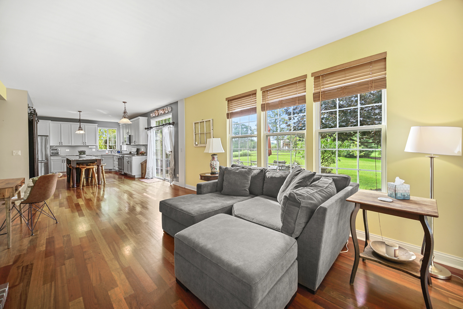 1826 Prairie Ridge Circle Lindenhurst, IL 60046 - Photo 10 of 39 a living room with furniture and a large window
