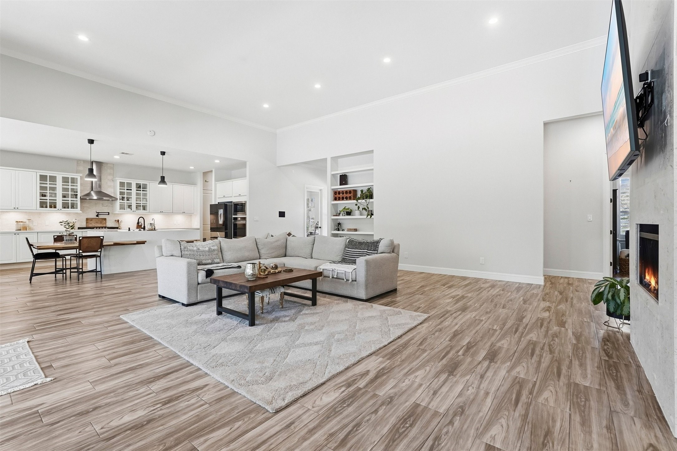 25202 Wilkes Park Road Tomball, TX 77375 - Photo 25 of 47 a living room with furniture and a wooden floor