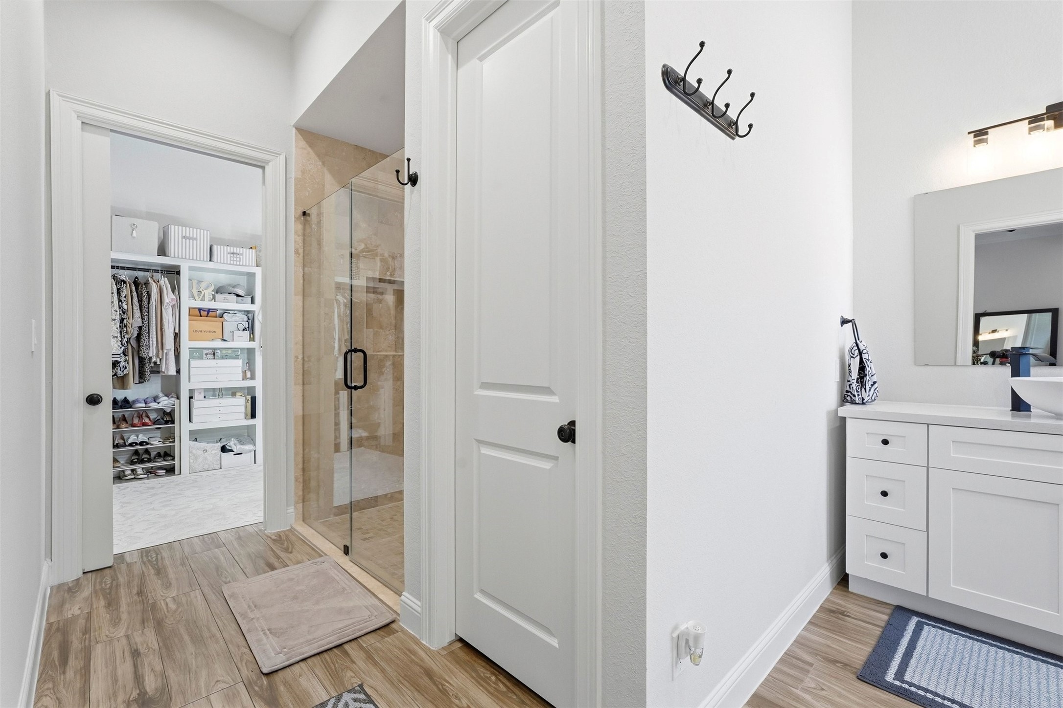 25202 Wilkes Park Road Tomball, TX 77375 - Photo 34 of 47 a view of bathroom with a sink mirror and shower