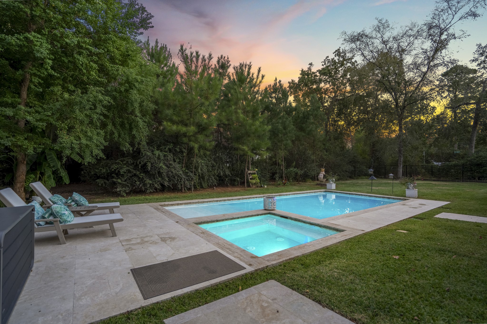 25202 Wilkes Park Road Tomball, TX 77375 - Photo 47 of 50 Resort inspired pool sits privately behind the home, surrounded by green space and mature trees.