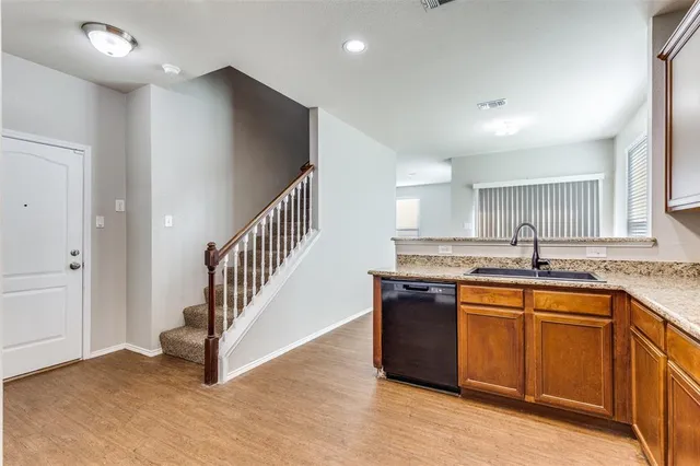 a bathroom with a sink a mirror and a toilet