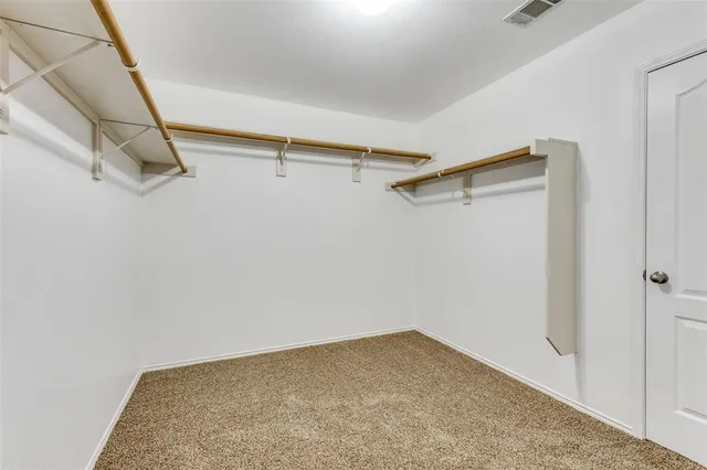 a bathroom with a sink a mirror and a shower