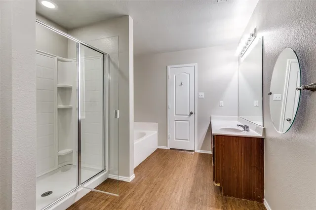 a bathroom with a double vanity sink mirror and double