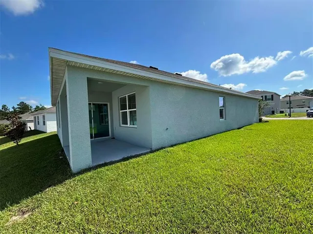 a view of a backyard with a garden