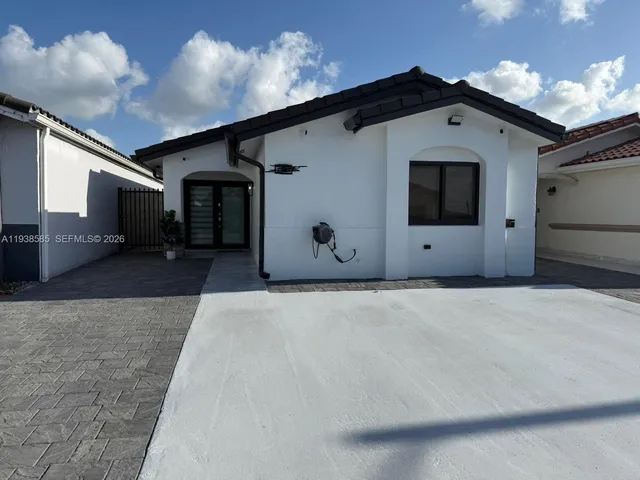 a view of a front of house with garage