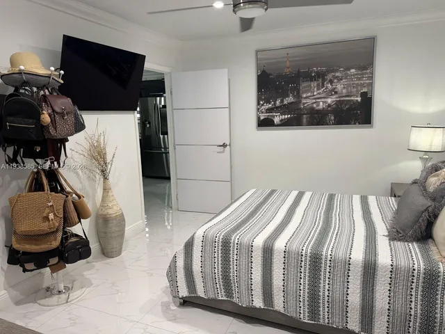 a bedroom with a bed and furniture