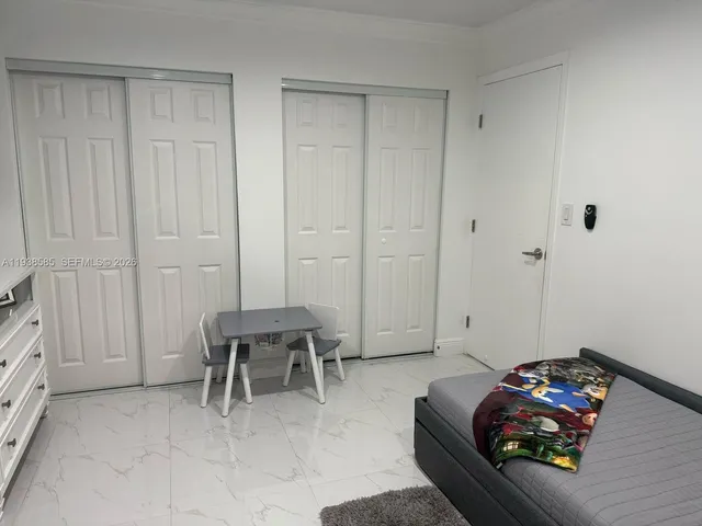 a view of a workspace with furniture